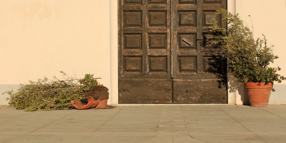 how to stop plant pots falling over in wind